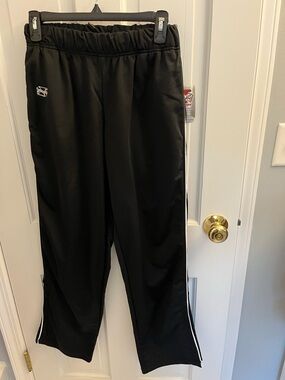 Intensity Black Womems Athletic Track Pants with Side Stripe. Zip at ankle